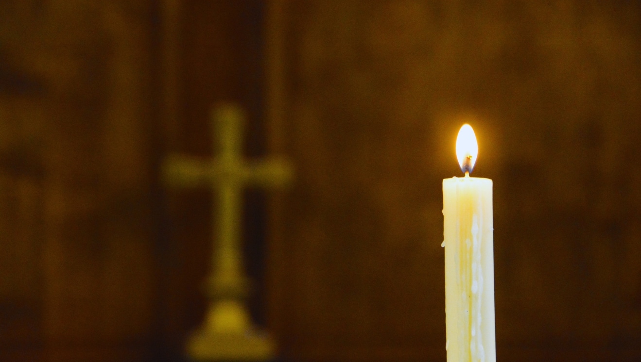 A lit candle near the altar. For why we worship like we do.