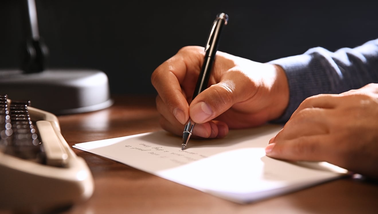 Man writing a letter