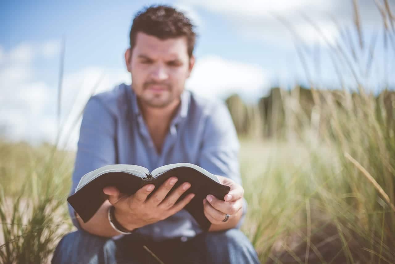Man with Bible for Omission
