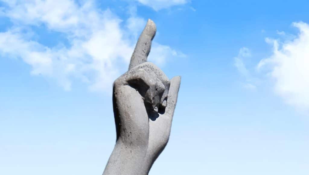 Pointing to Heaven. For One God.