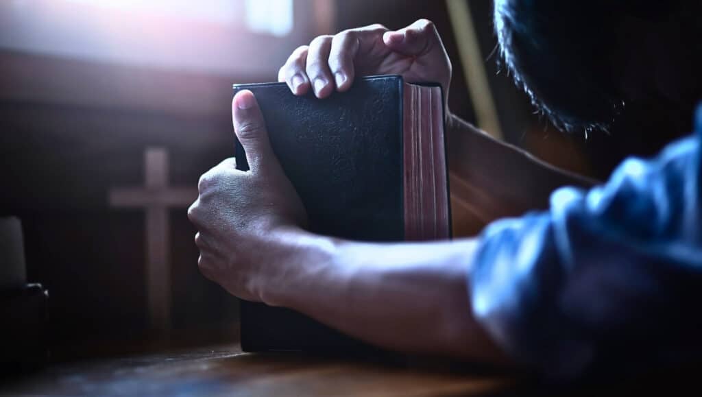 Man praying. For "Miserable Offenders."