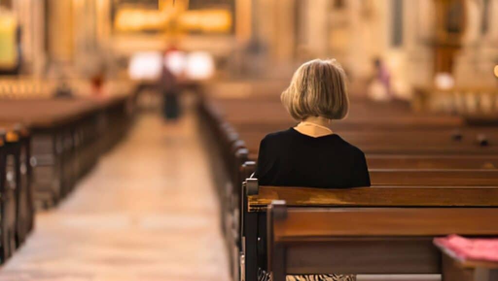 Parishioner in Church Pew. Narcisa Palici's Images.